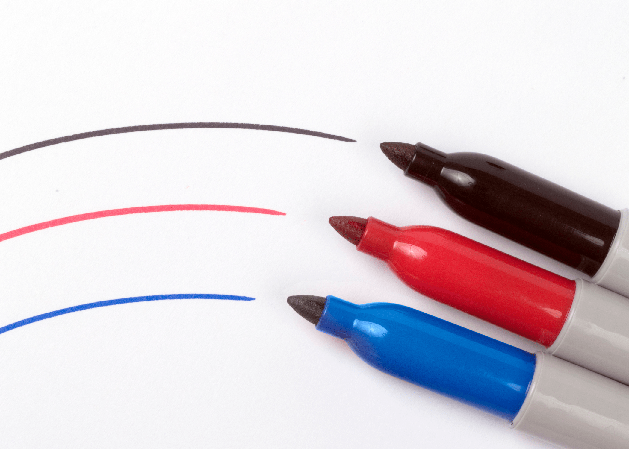 black red and blue sharpie on white background