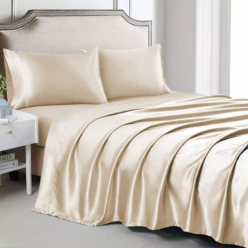 cream silk sheet set on queen bed