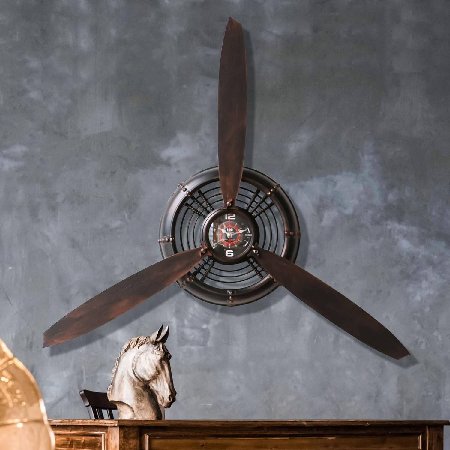 An airplane propeller used as art in living room.