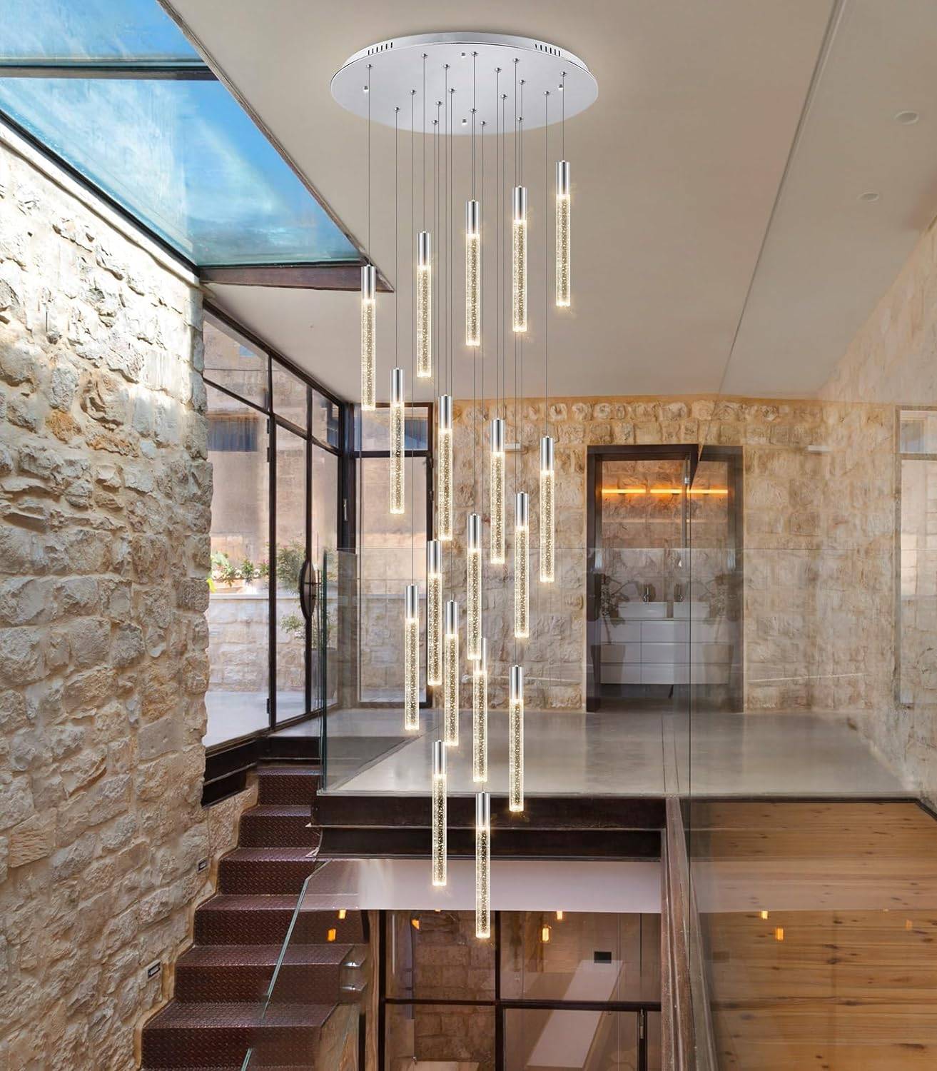 A staircase with glass lighting fixture.