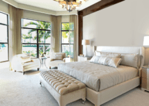 A large master bedroom with smart storage solutions.
