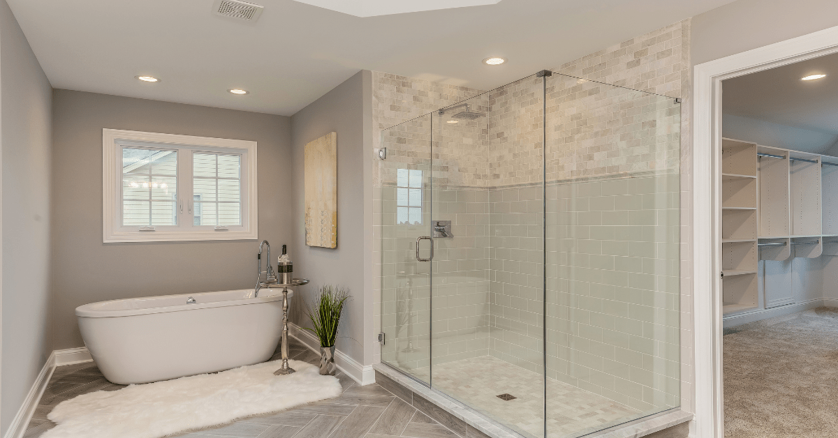 A stunningly modern bathroom with glass shower.