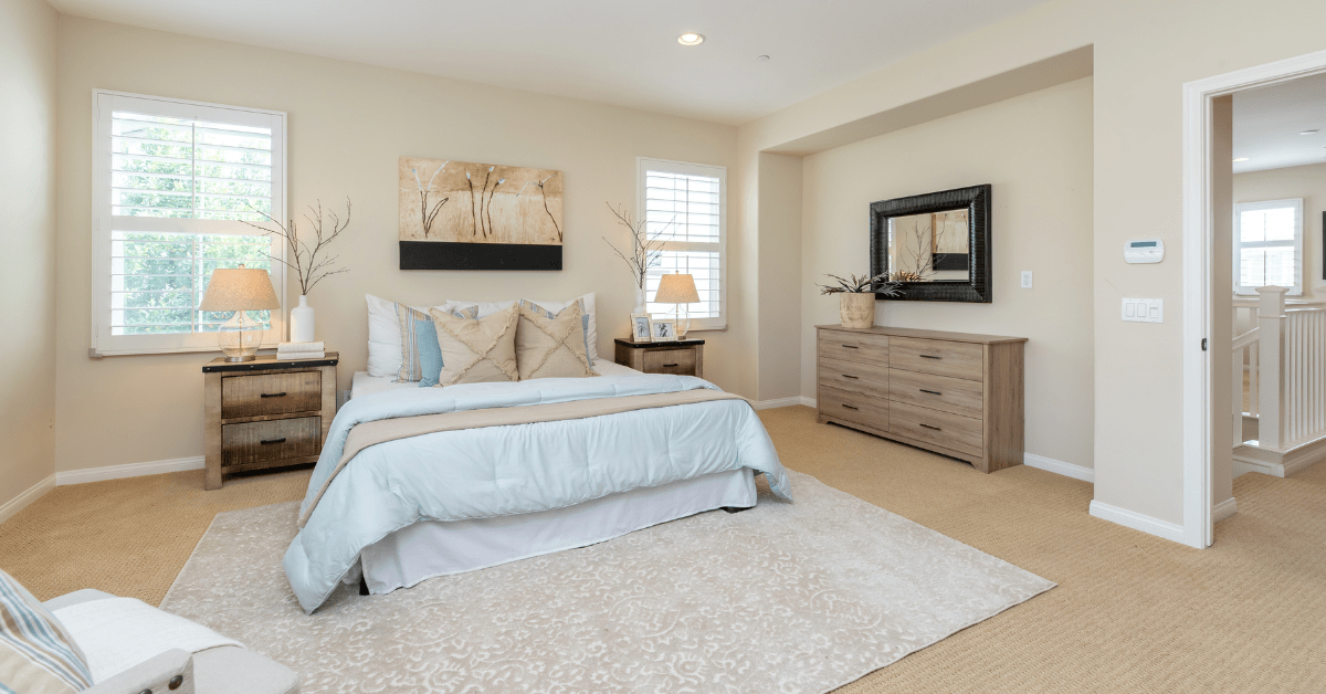 A reading nook in a large master bedroom.