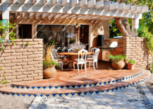 large deck with white pergola and white chairs