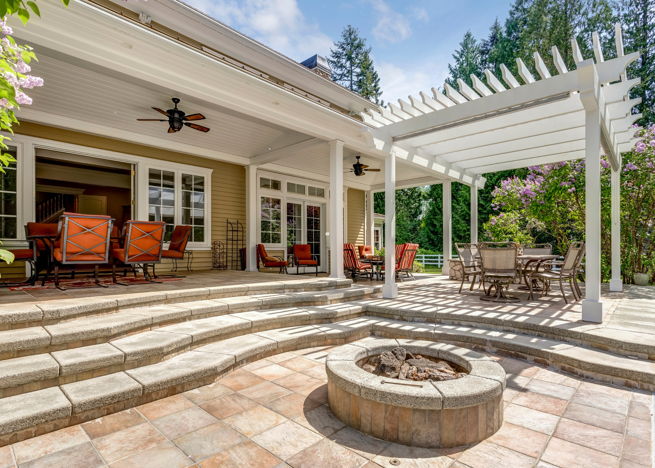 large deck with stairs and patio furniture