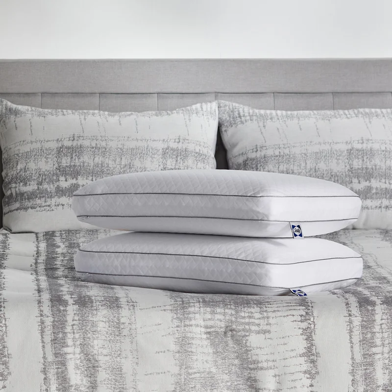 memory foam pillows on grey bedding