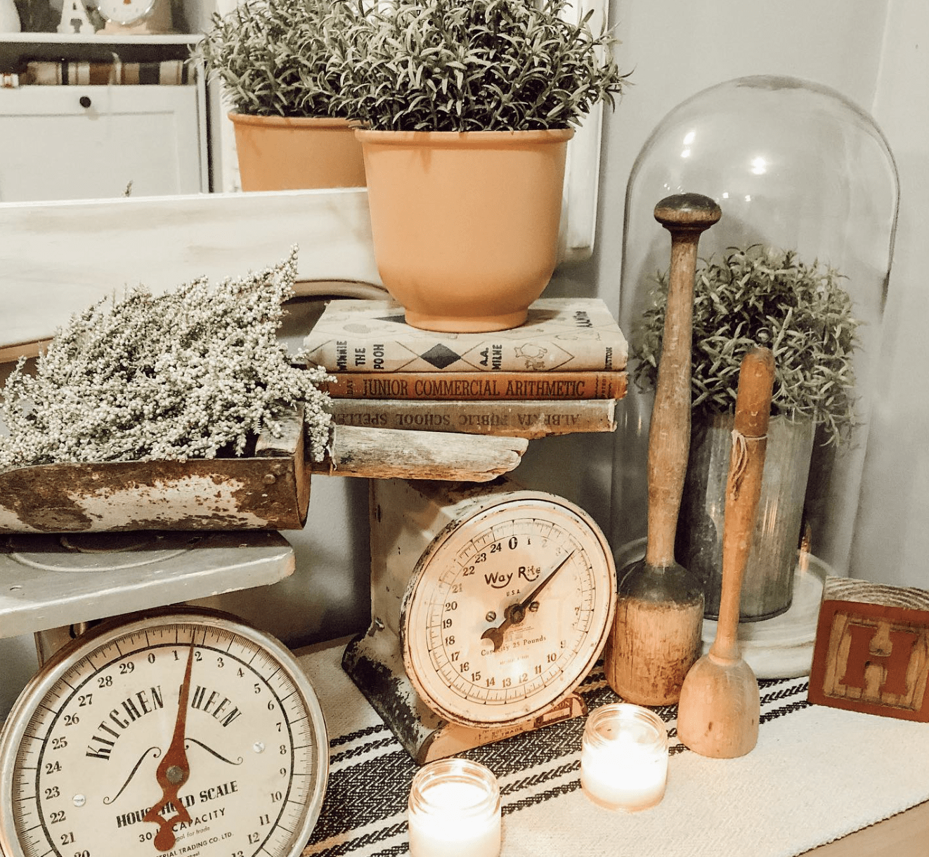 antique scales and greenery vintage mashers