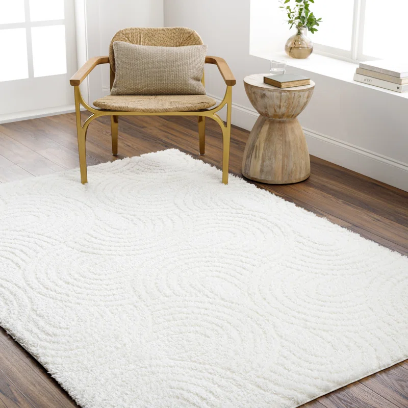 white fluffy rug with boho chair