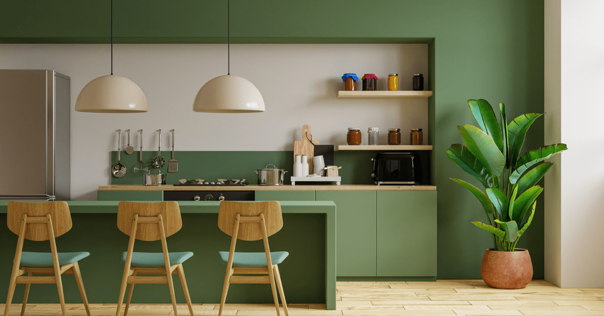 Green modern kitchen with plant.