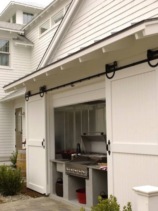 BBQ nook to house your grill with sliding barn doors.