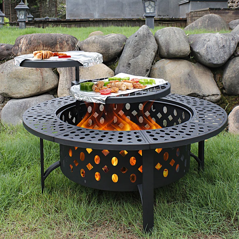 fire pit on grass bbq on top