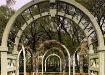 Green wooden garden arch.