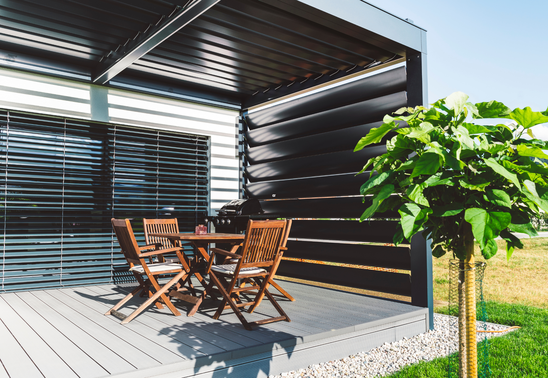 Pergola Blinds on black pergola.