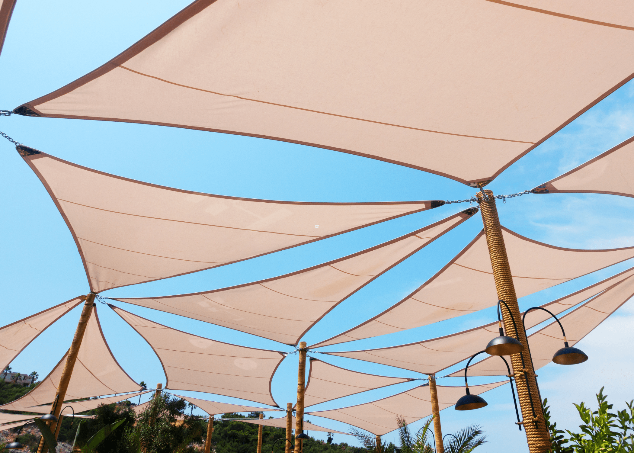 Beneath view of Shade Sails on pergolas.