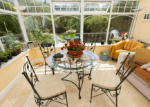 small sunroom space with patio bistro set