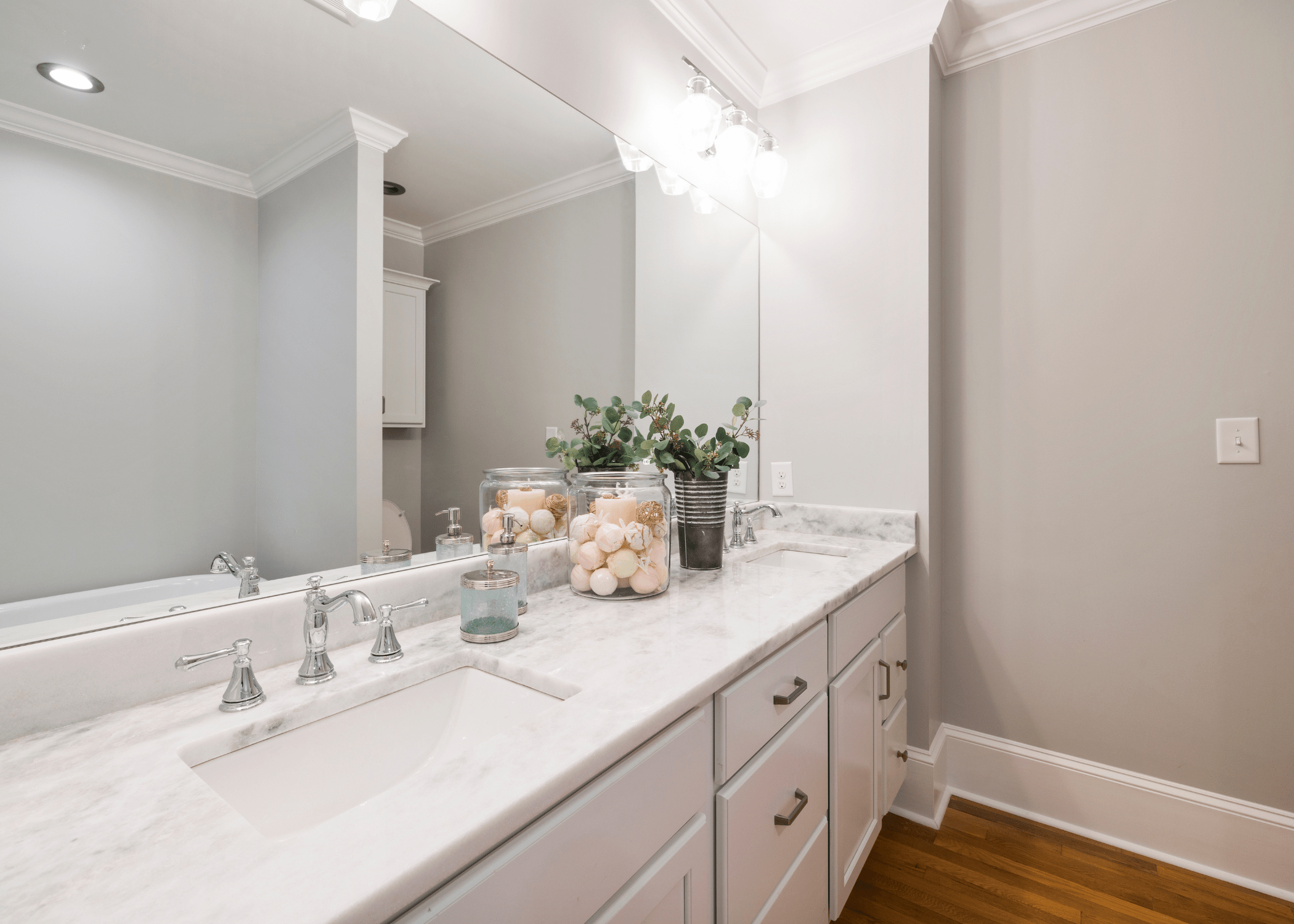 white and grey bathroom with marble countertop