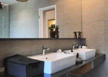 black countertop bathroom with countertop vanity sinks