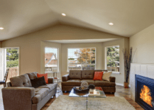 A living room with vaulted ceiling.