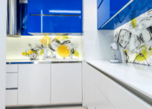 A kitchen with blue and white theme.