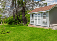 A large shed with shingled roof.