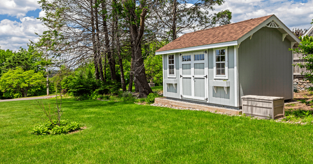 A large shed with shingled roof.