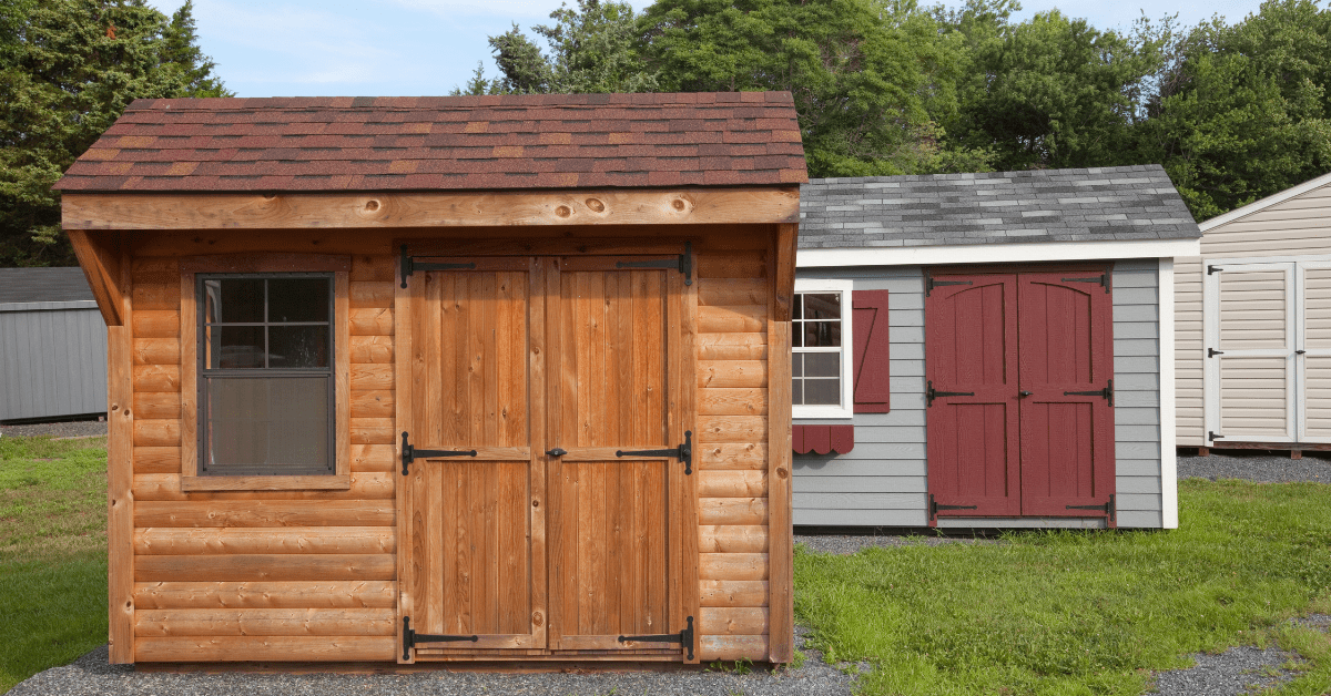 An assortment of sheds for sale.