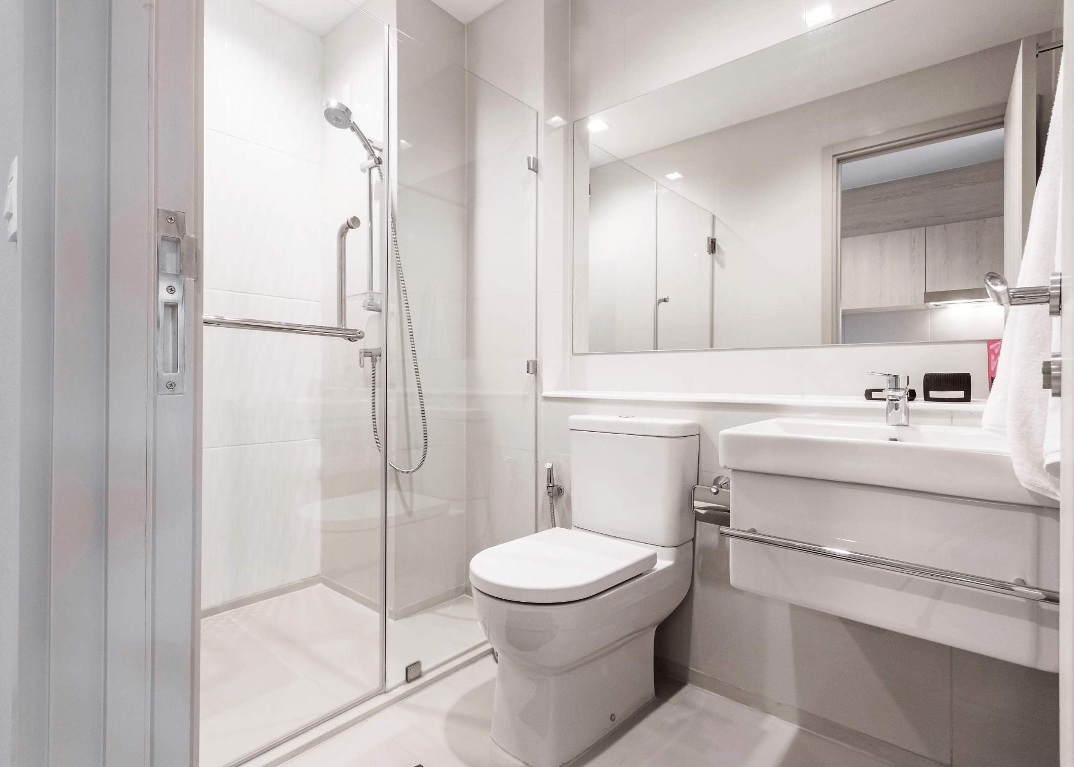 white 3/4 bathroom with shower stall