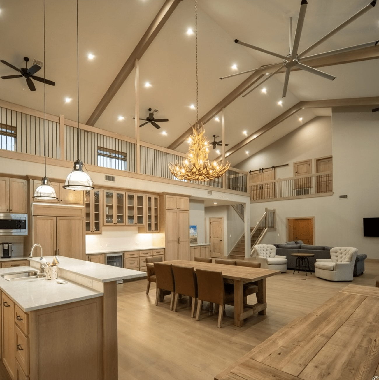 interior of barndominium with high vaulted ceilings