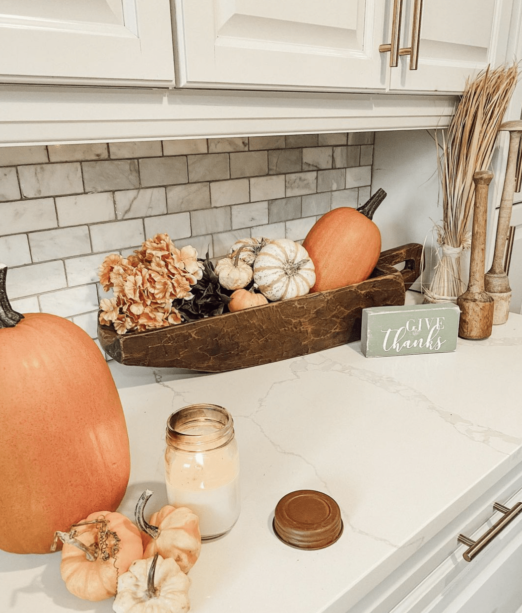 marble countertop decorated for fall