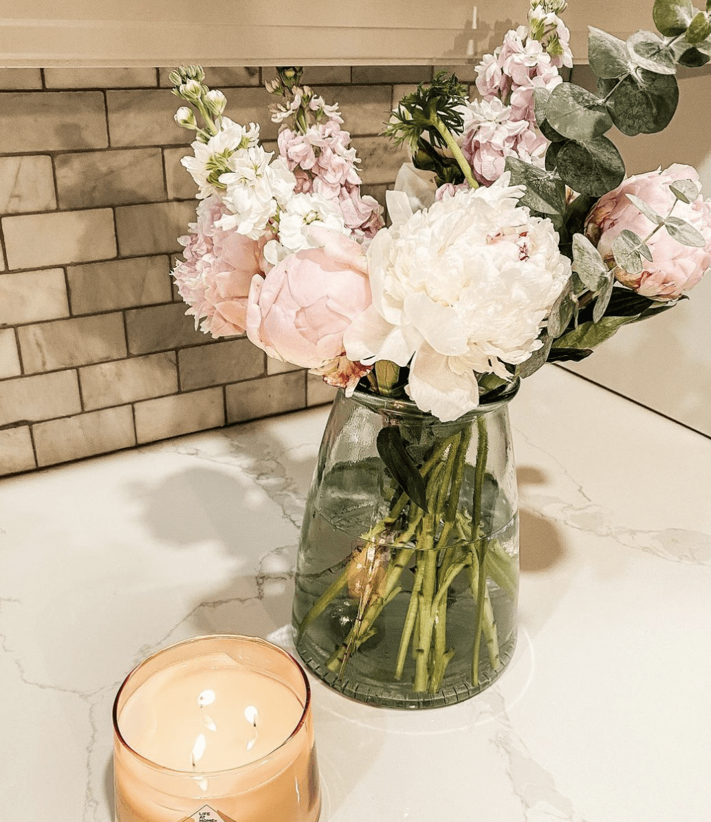 flower arrangement on marble countertops