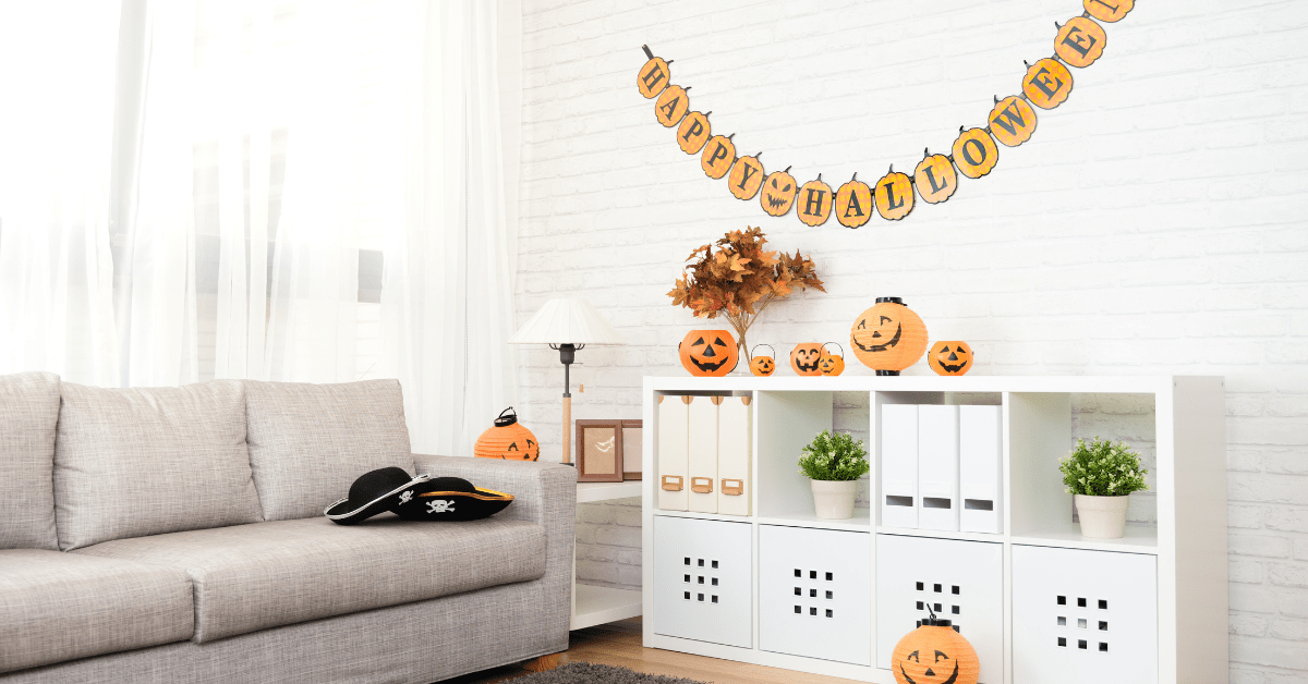 A bookshelf with halloween decoration.