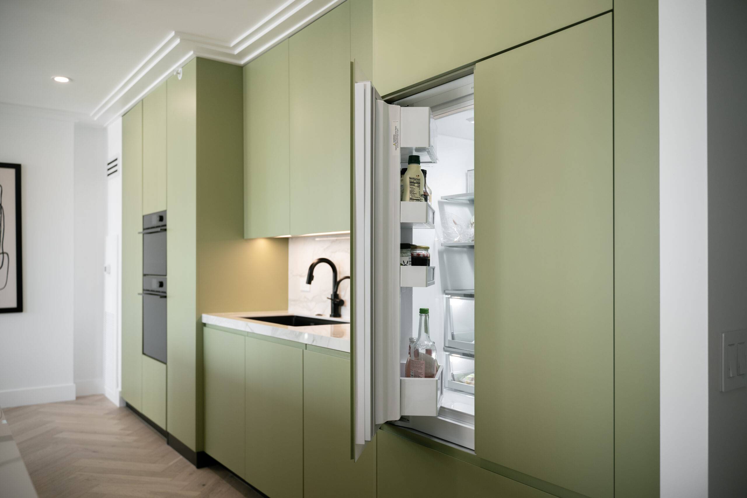 Hidden sage green cabinet fridge.