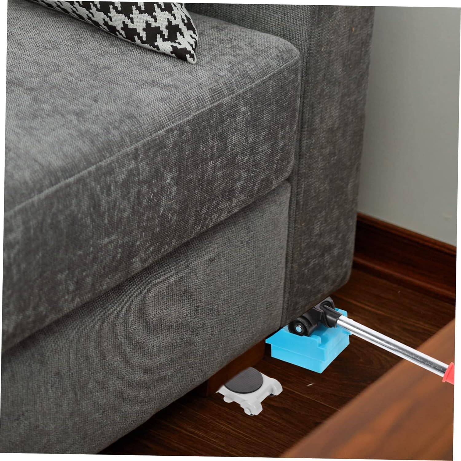 furniture sliders being placed under couch