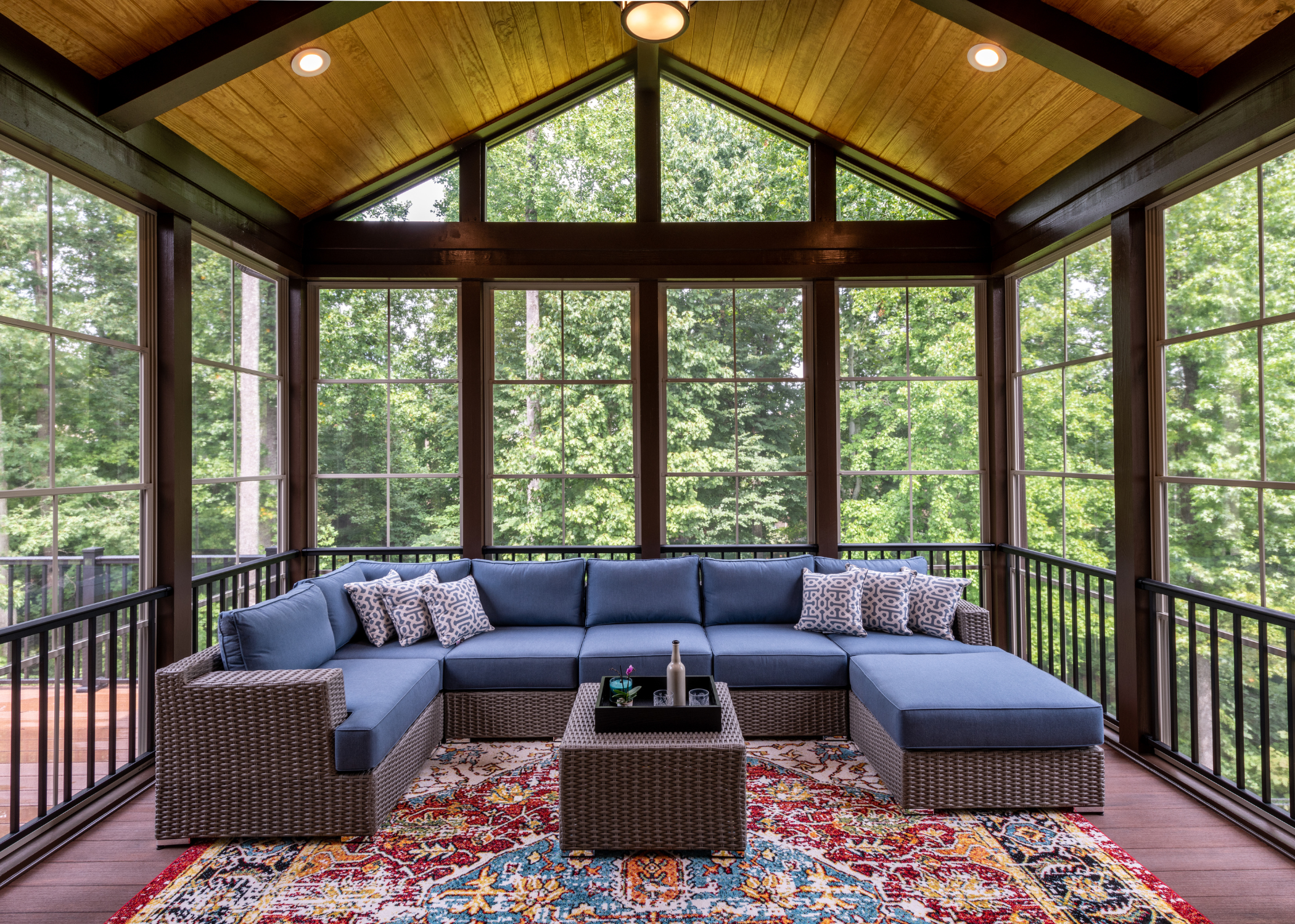 screened in porch with outdoor sectional