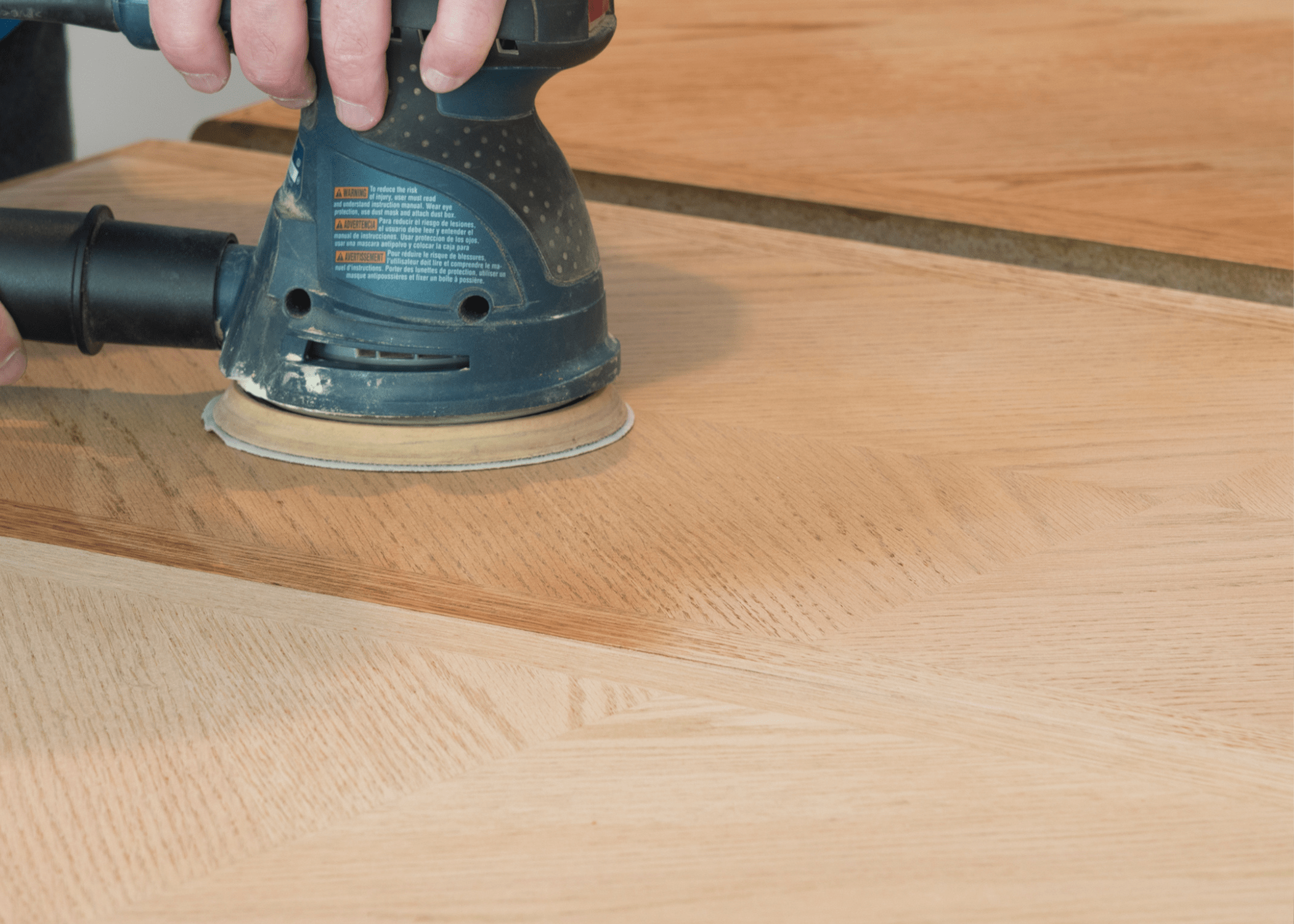 sanding wood table.