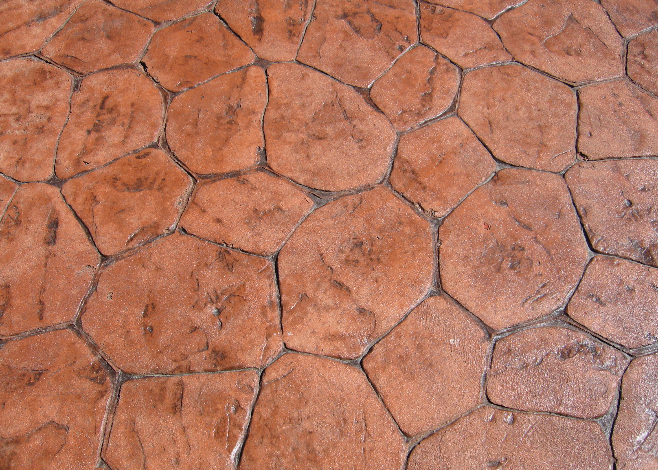 stamped concrete patio red terracotta cement