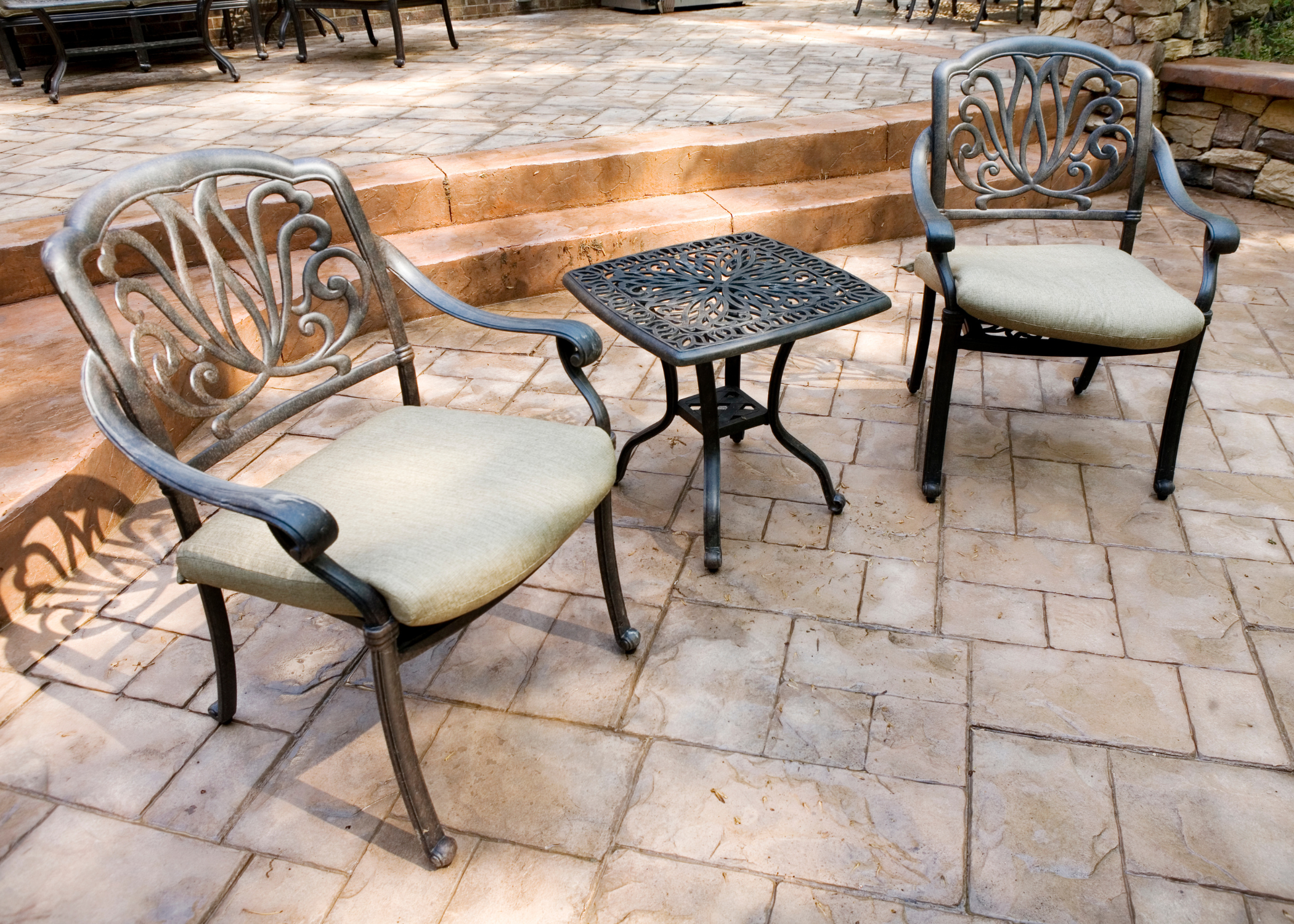 stamped concrete patio bistro set