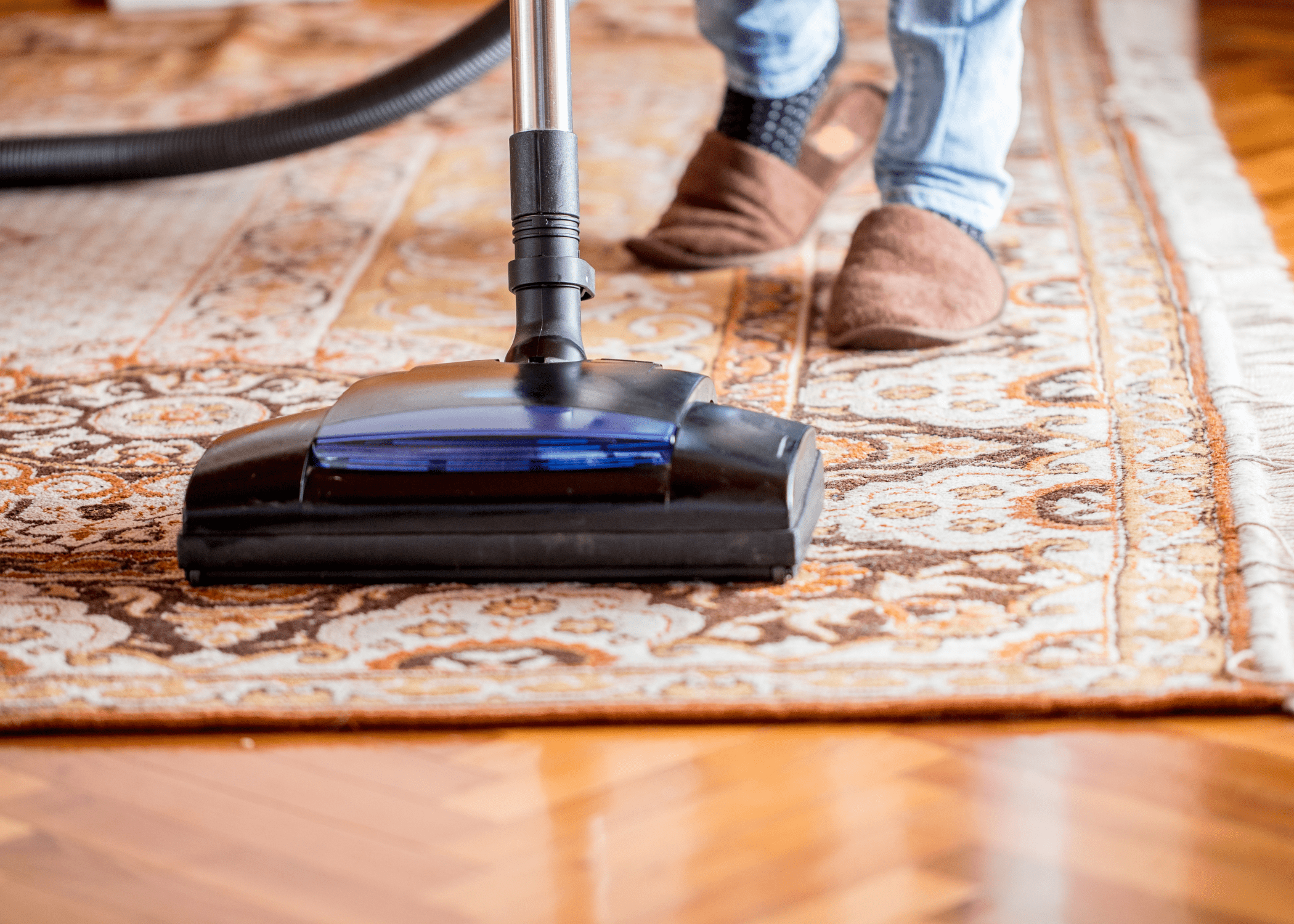 close up off vacuum on area rug