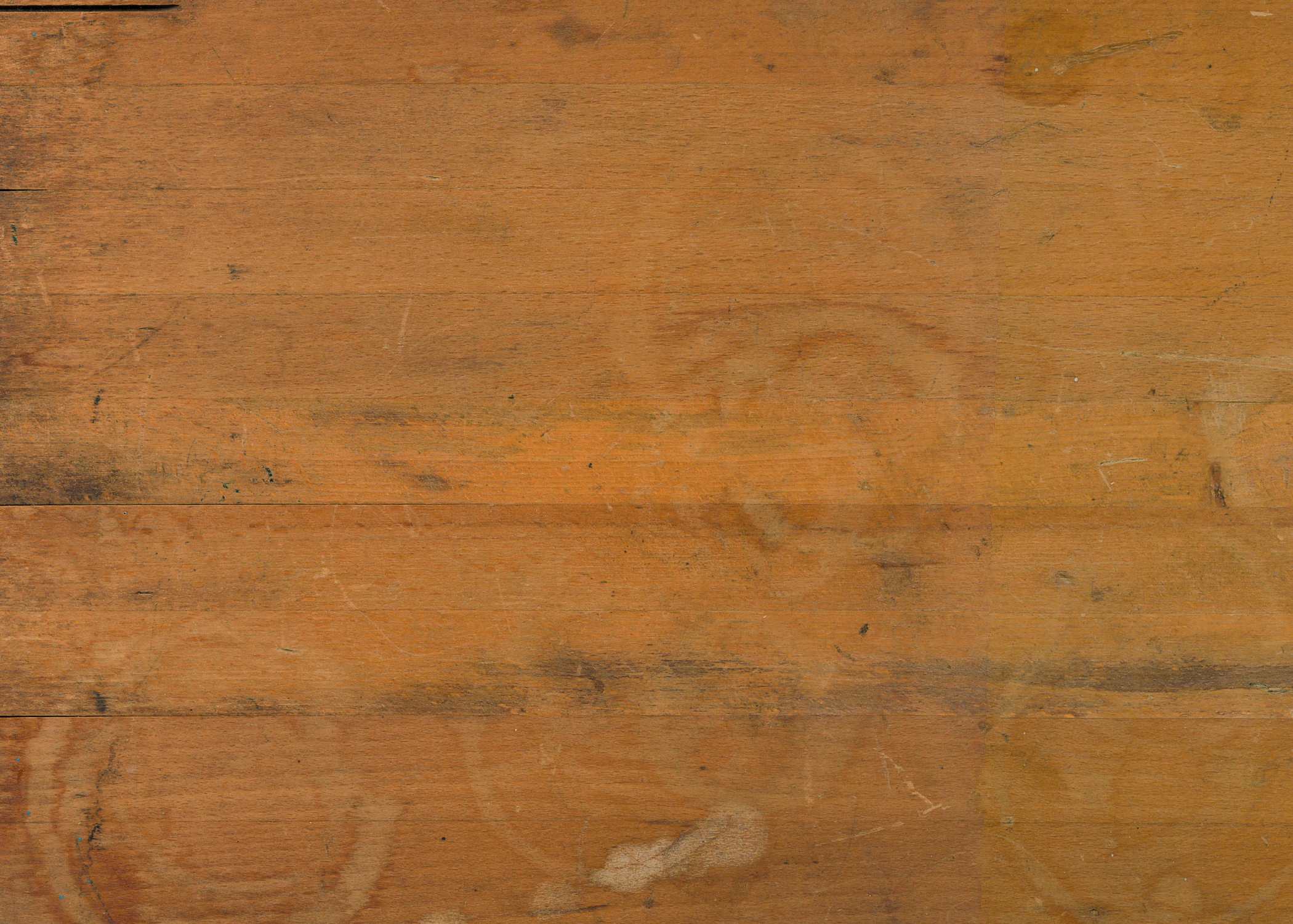 water rings on wood table surface.