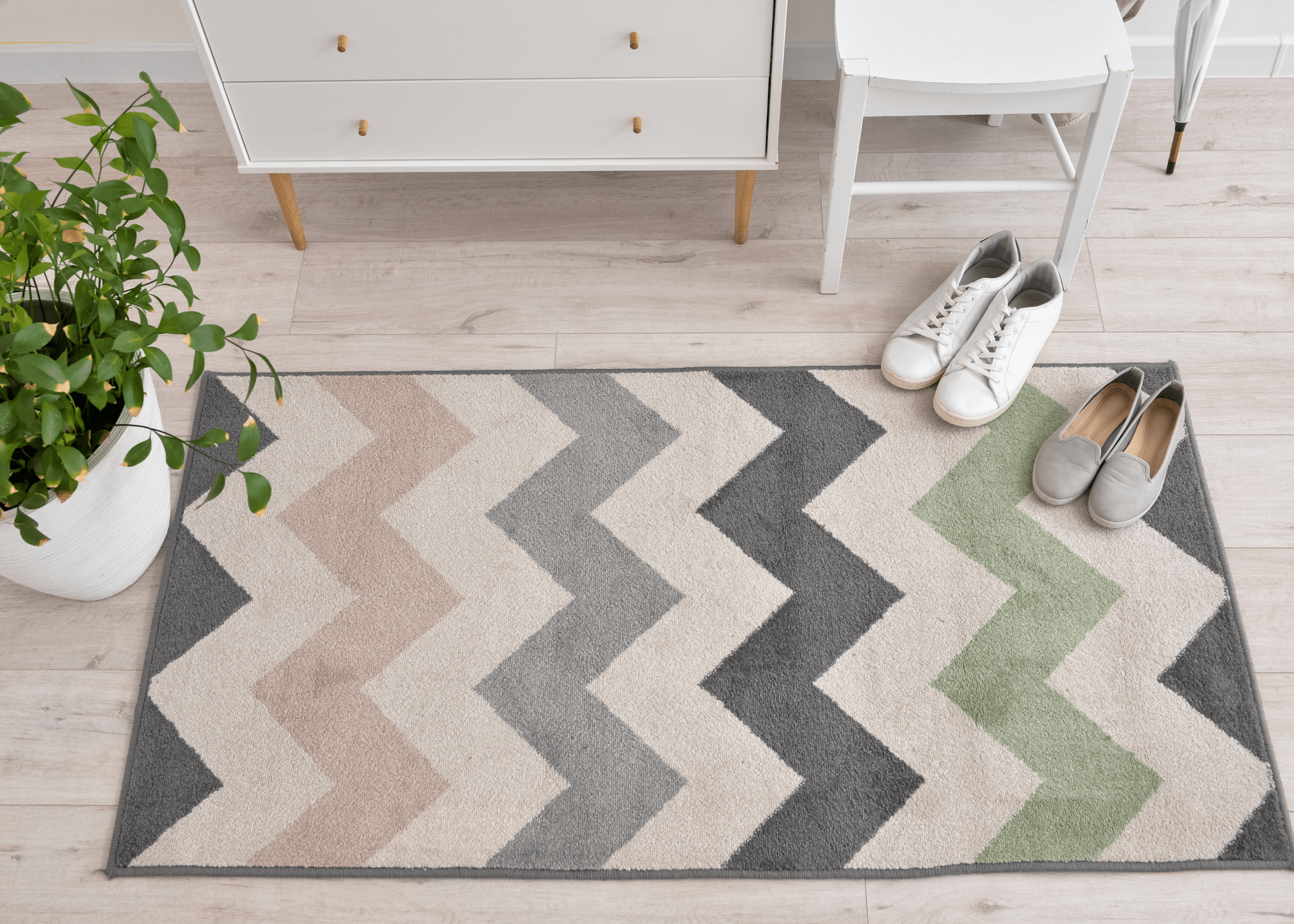 small chevron rug with shoes on it