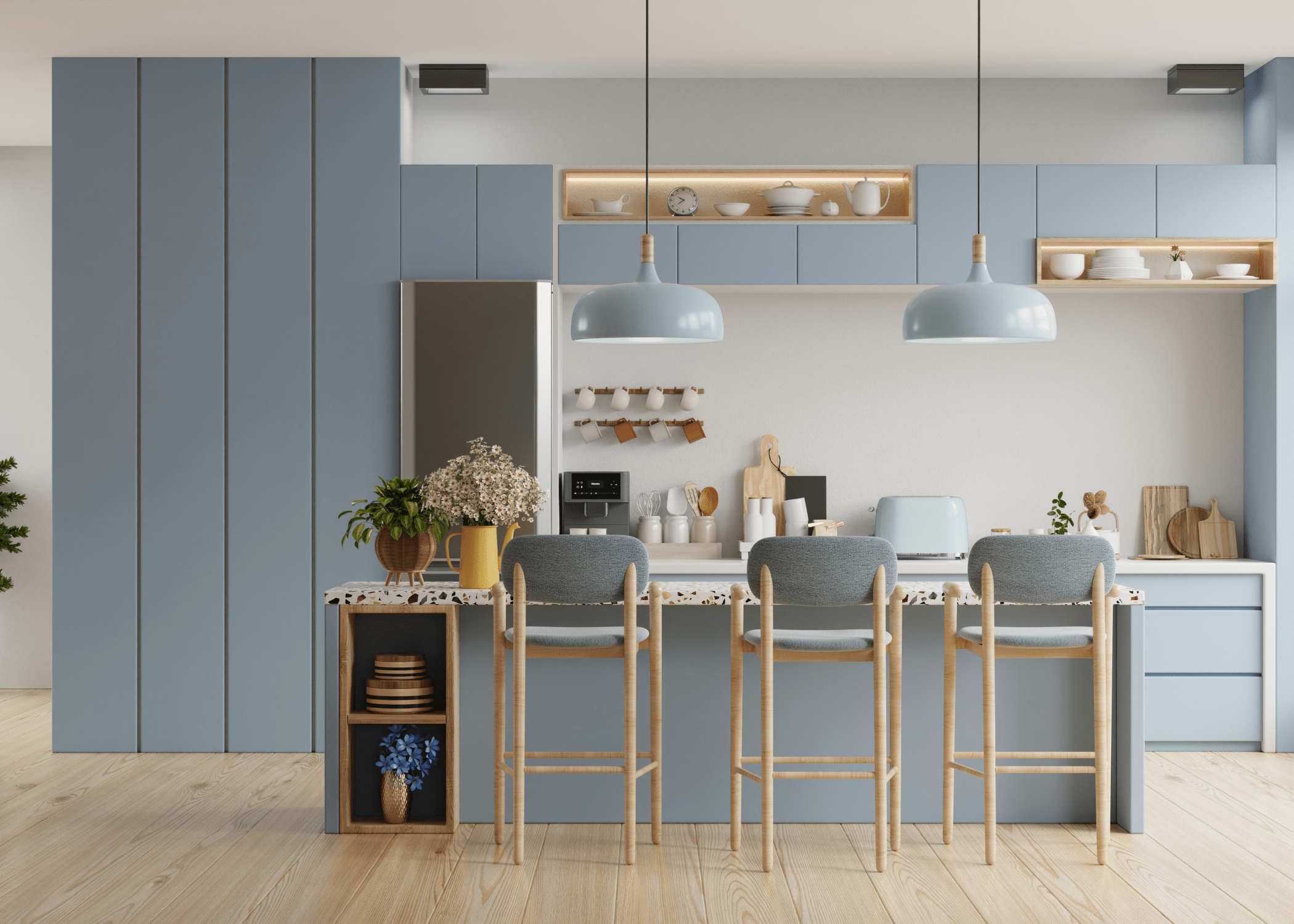 light powder blue kitchen with hanging pendants and island