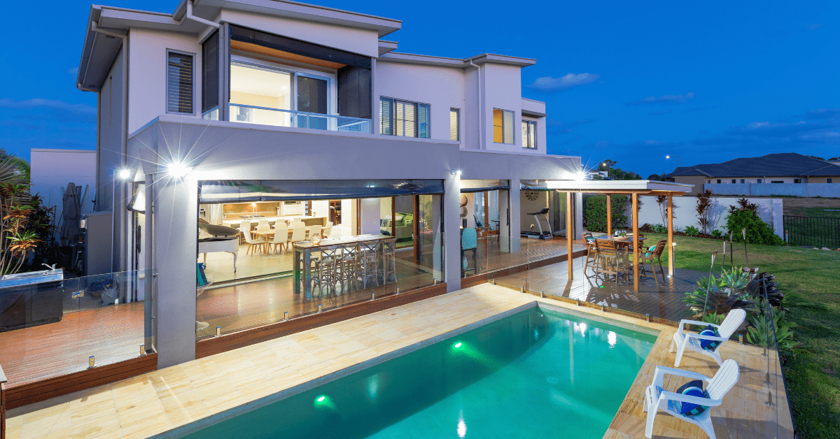 Exterior of a house with pool.