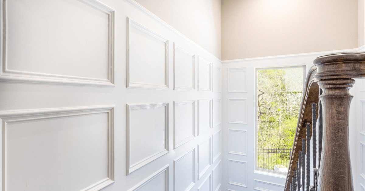 White wood panelling on the wall.