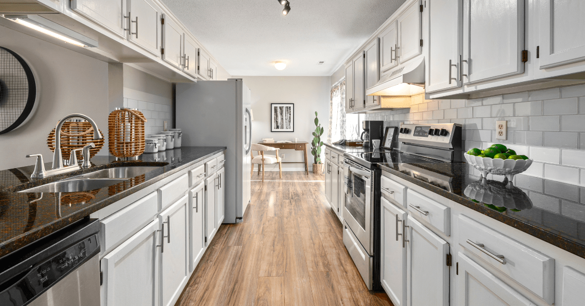 Modern kitchen with wooden floors.