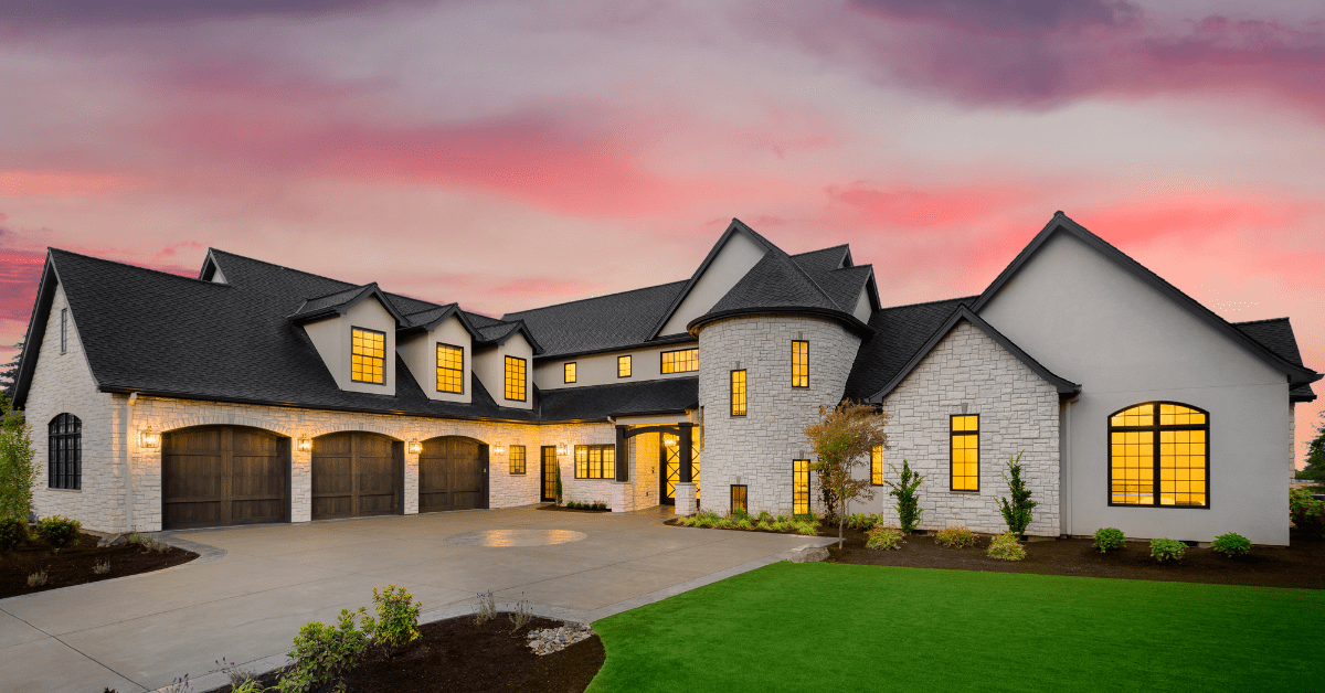 Large house with big driveway.