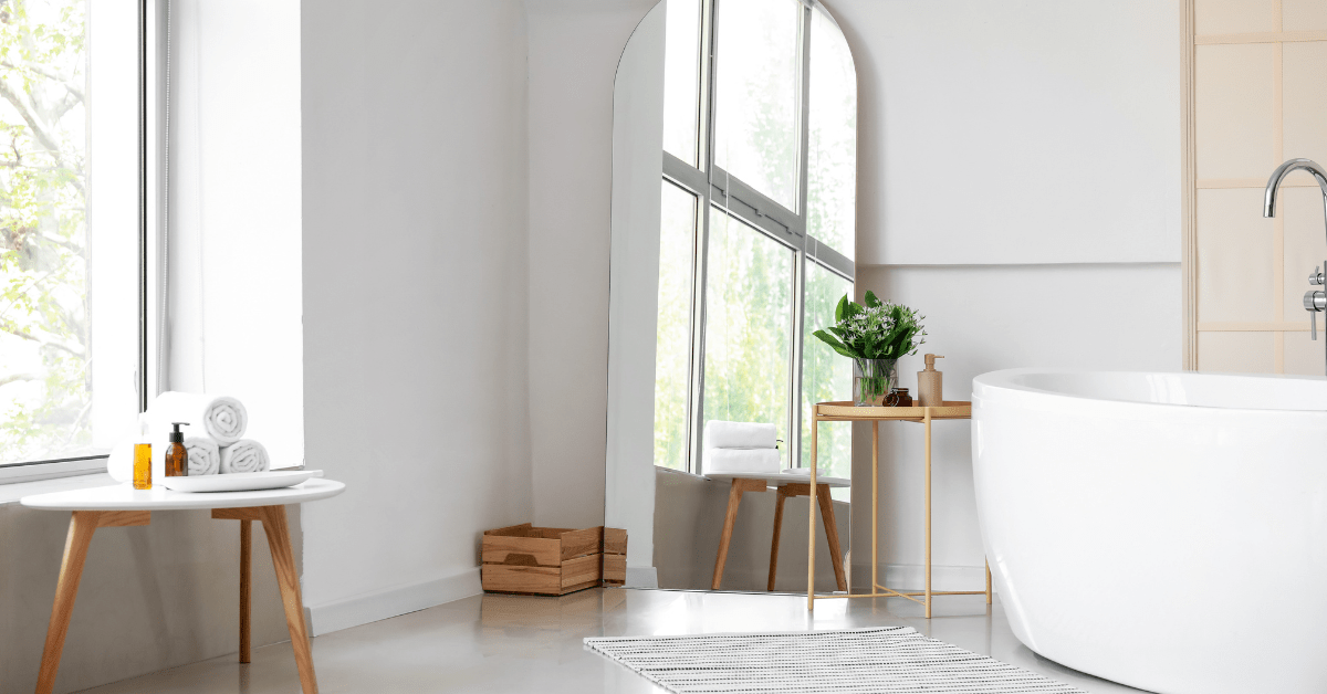 Large bathroom with wooden furniture.