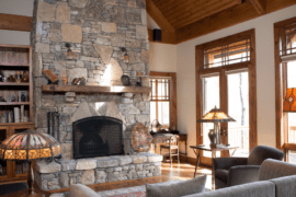 The Game-Changing Impact of a Floor-to-Ceiling Stone Fireplace