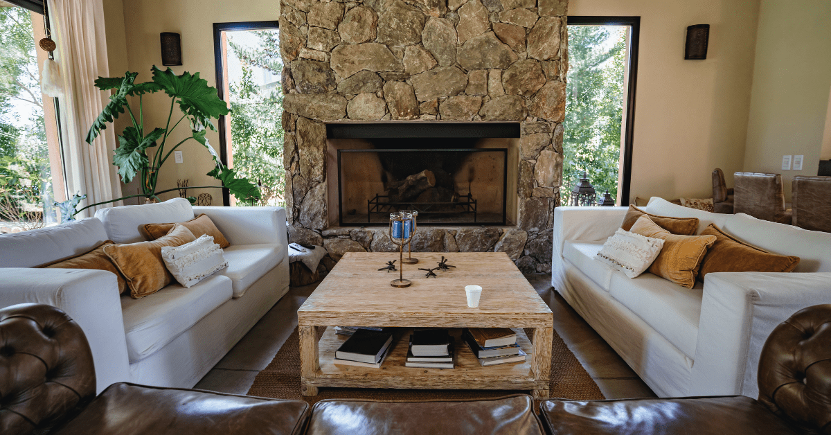 Stone fireplace in a living room.