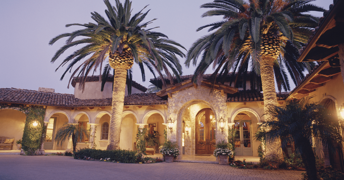 Stone exterior of a large modern house.