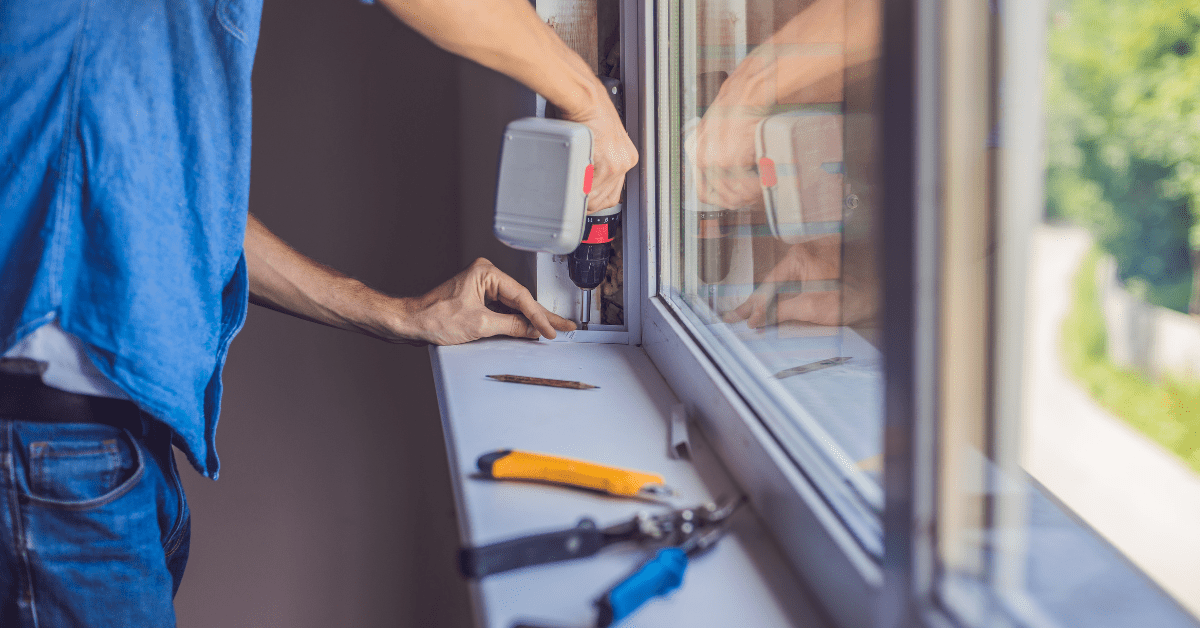 Worker installing new window.